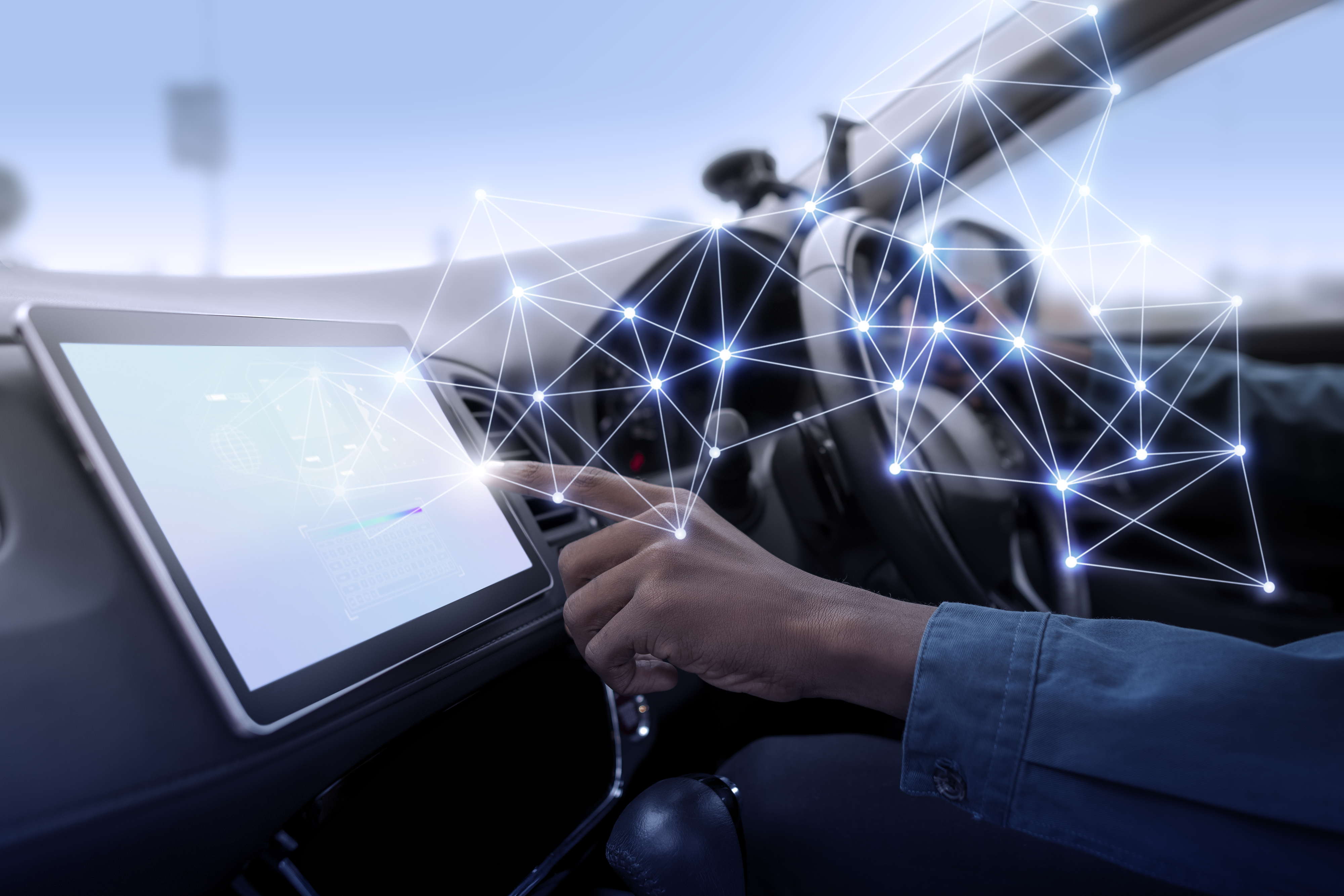 Driver interacting with a connected in-car touchscreen